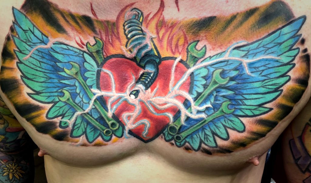 Hotrod Chest by Spiro at Artistic Impressions Tattoo Studio located in Katy, Texas