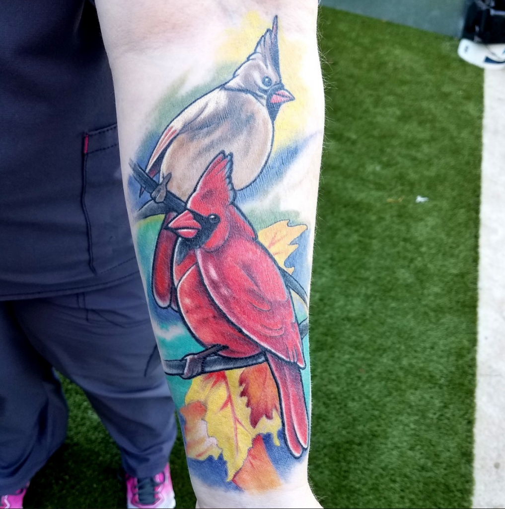 Cardinal Pair by Spiro at Artistic Impressions Tattoo Studio located in Katy, Texas