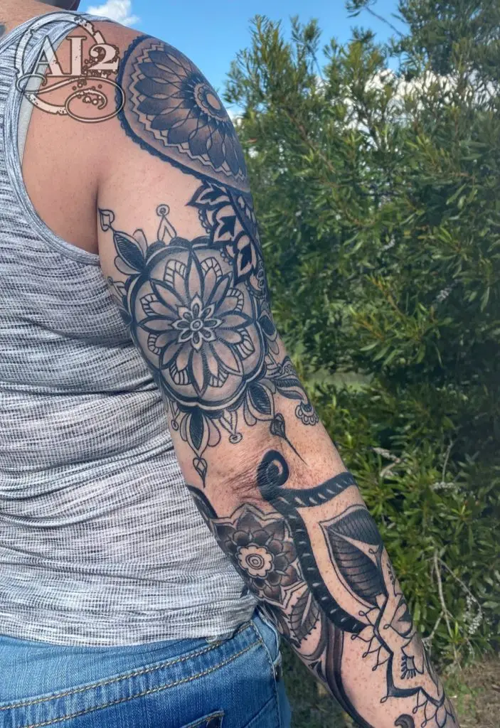 Tattoo collector with multiple mandala tattoos