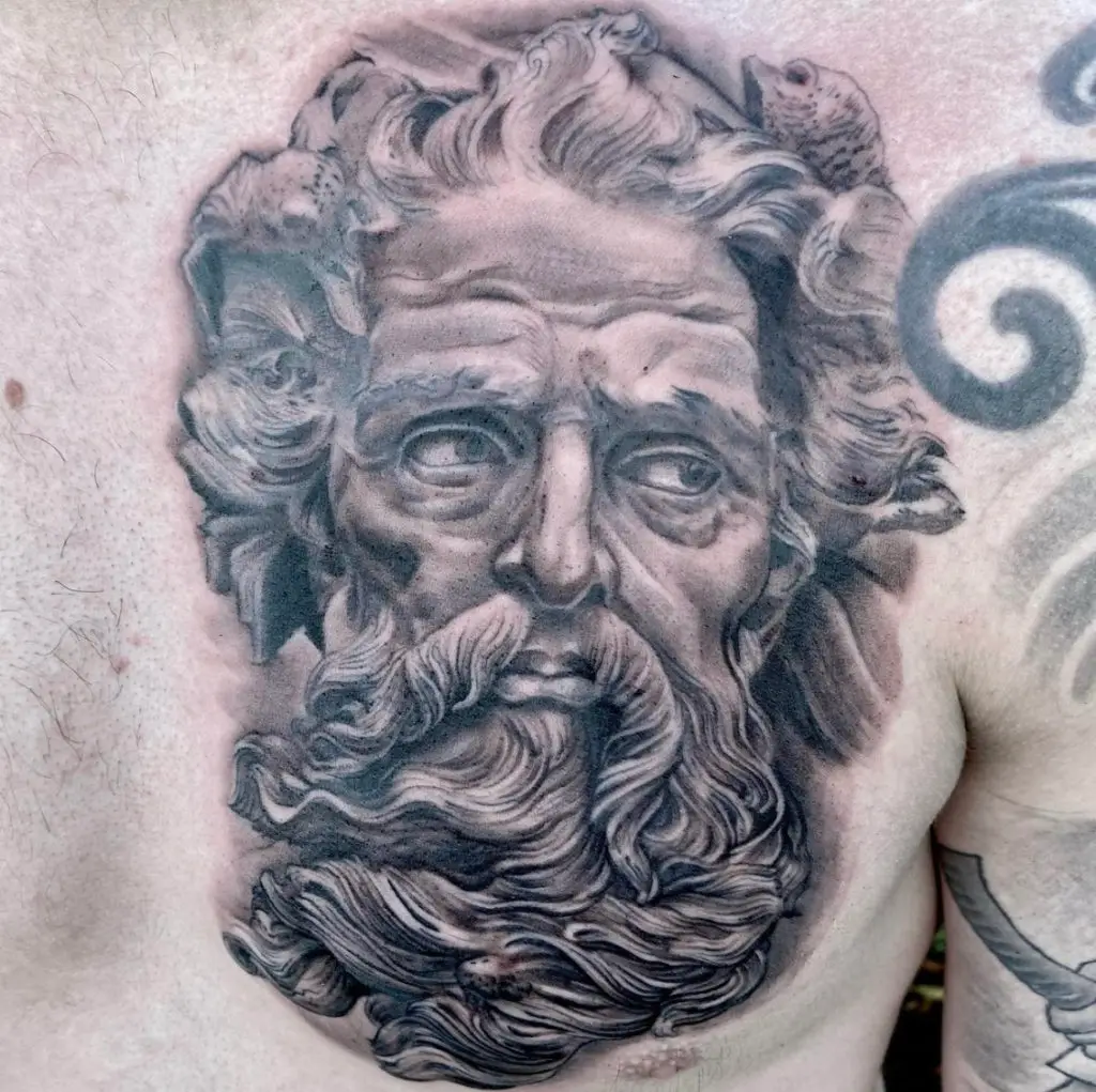 a tattoo of a statue head by Christina at Artistic Impressions Tattoo Studio in Cypress, Texas