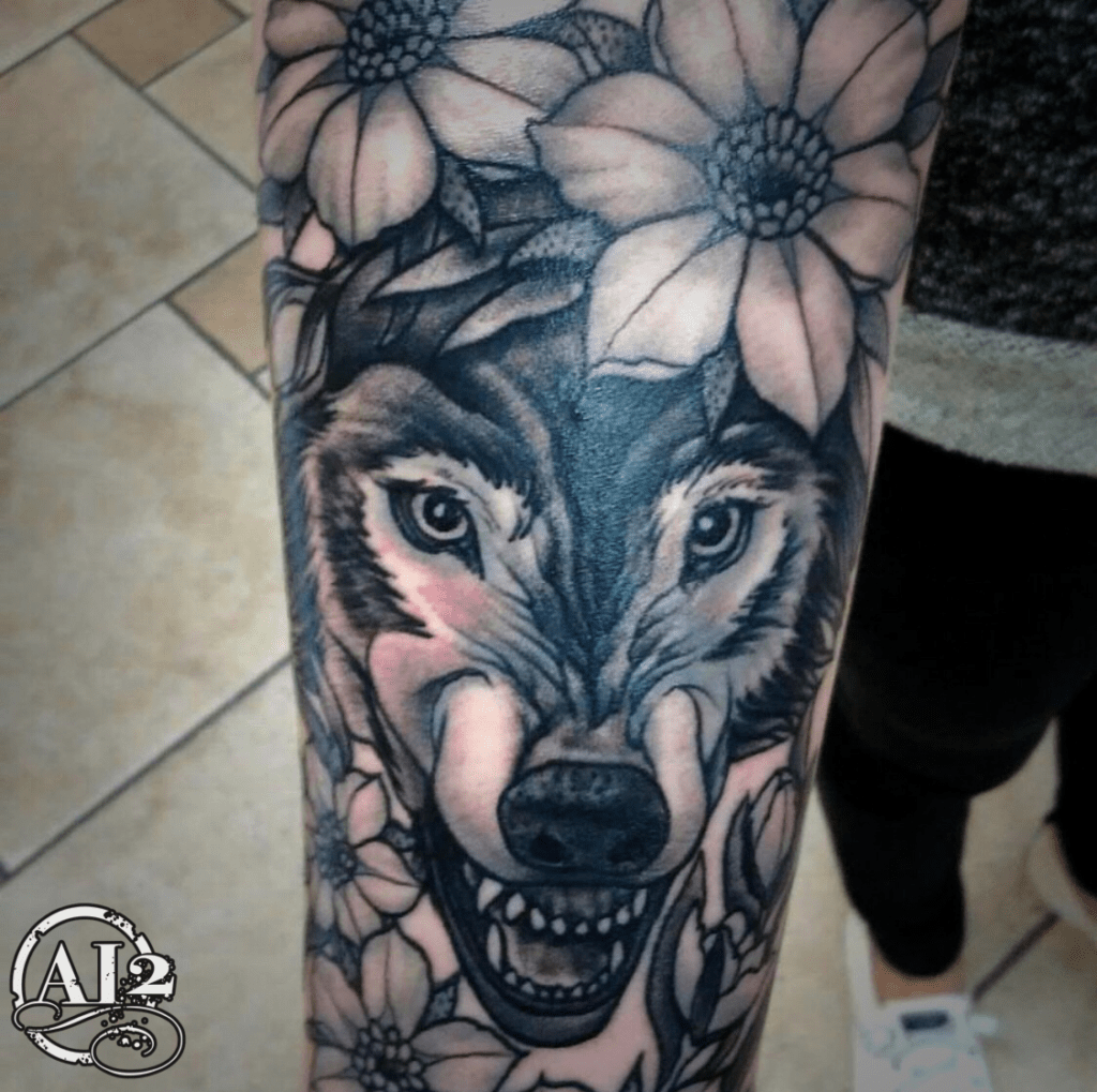 wolf and flower tattoo