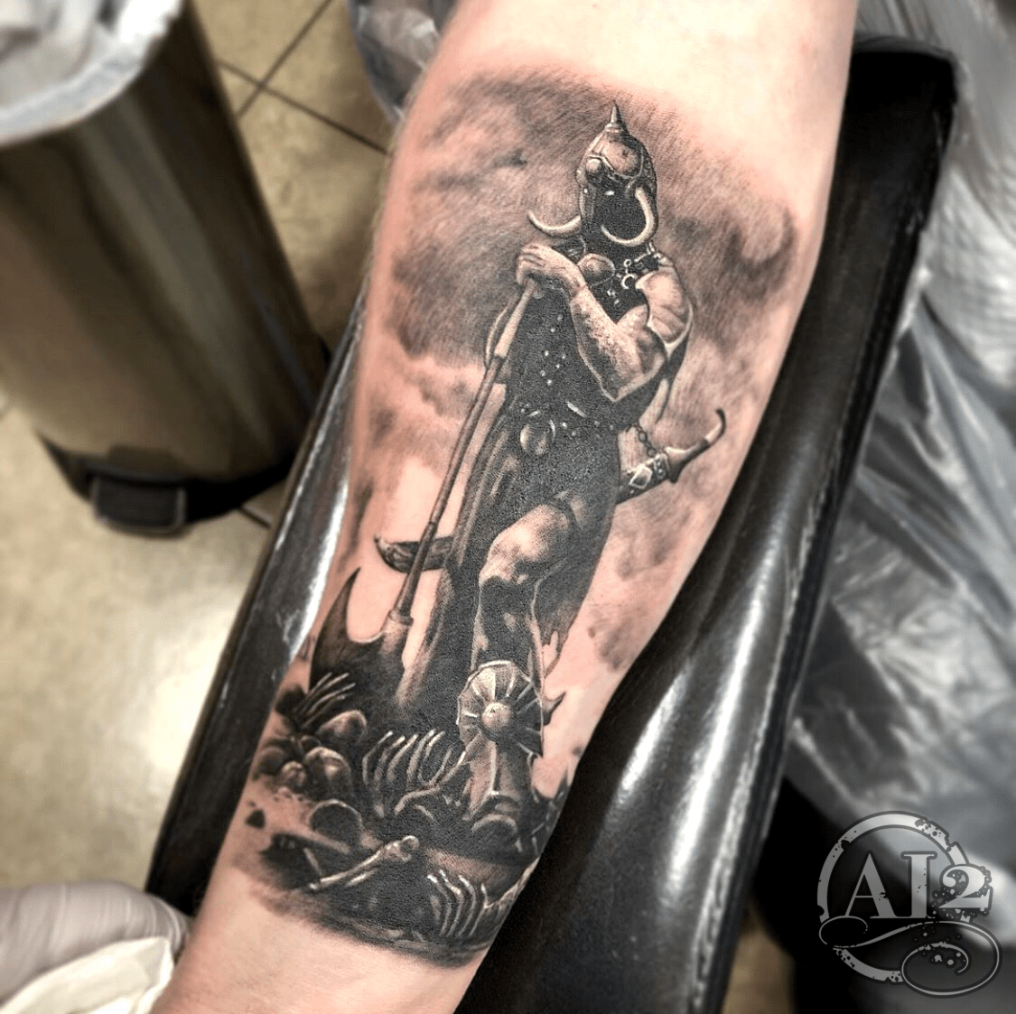 Hand poked knight tattoo on the inner forearm.
