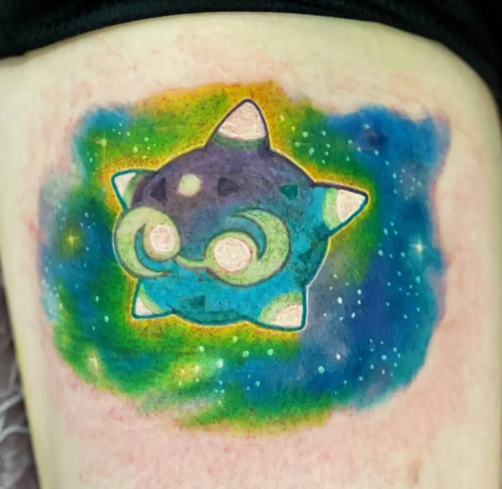 a tattoo of a Pokémon design by Mark Anthony at Artistic Impressions Tattoo Studio in Katy, Texas