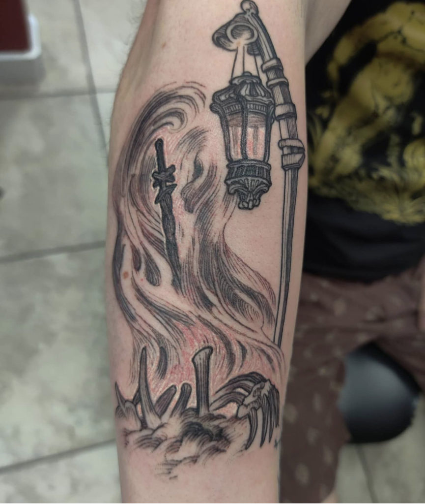 a lantern tattoo by Mark Anthony at Artistic Impressions Tattoo Studio in Katy, Texas