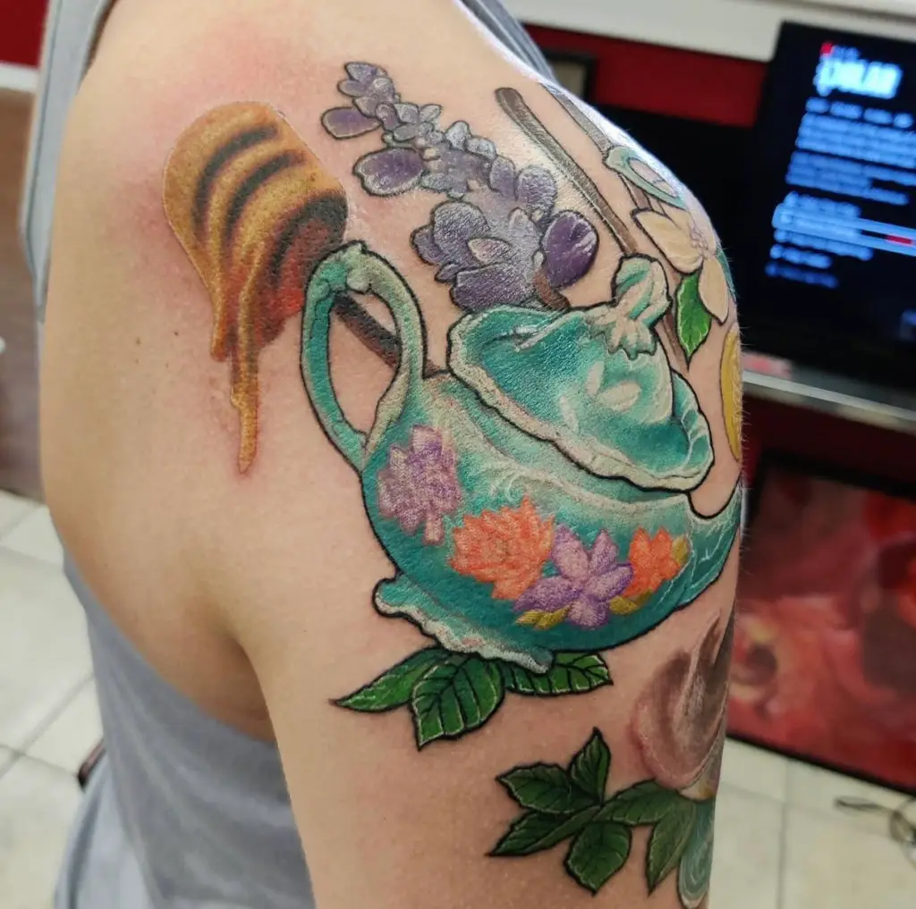 a tattoo of a teapot by Mark Anthony at Artistic Impressions Tattoo Studio in Katy, Texas