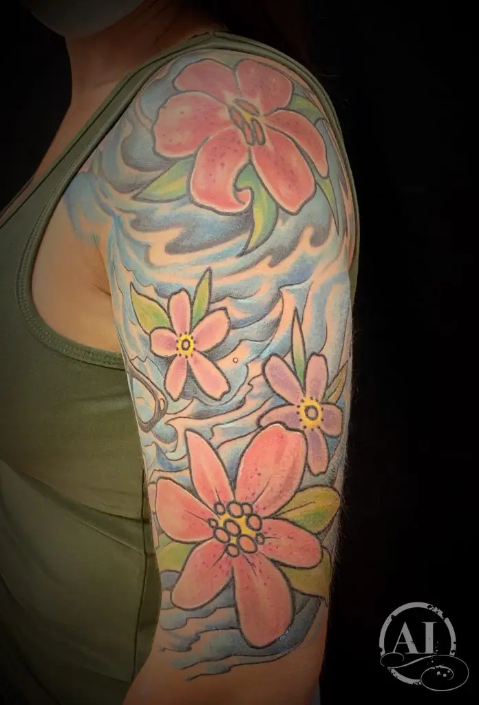 Water and flowers by Spiro at Artistic Impressions Tattoo Studio located in Katy, Texas