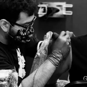 Nick tattooing at Artistic Impressions Tattoo Studio in Katy, Texas