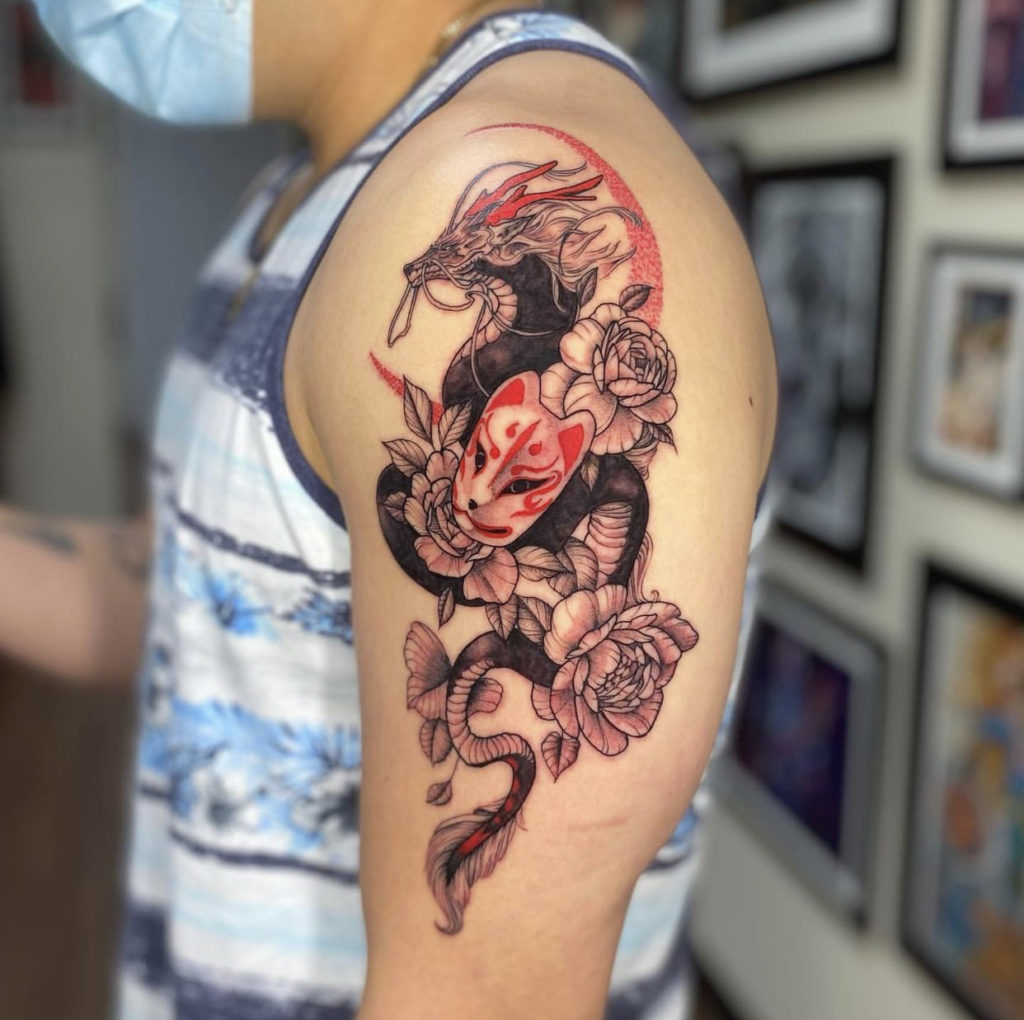 Dragon tattoo by Nick at Artistic Impressions Tattoo Studio in Katy,Texas