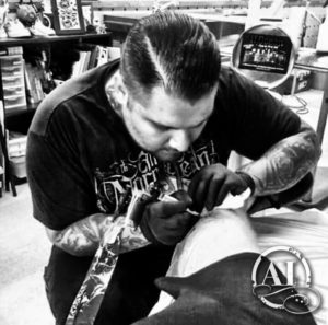 Mike Valadez tattooing at Artistic Impressions Tattoo Studio in Katy, Texas