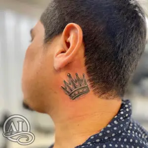 a tattoo of the crown on the neck by Biggie at Artistic Impressions Tattoo Studio in Cypress, Texas