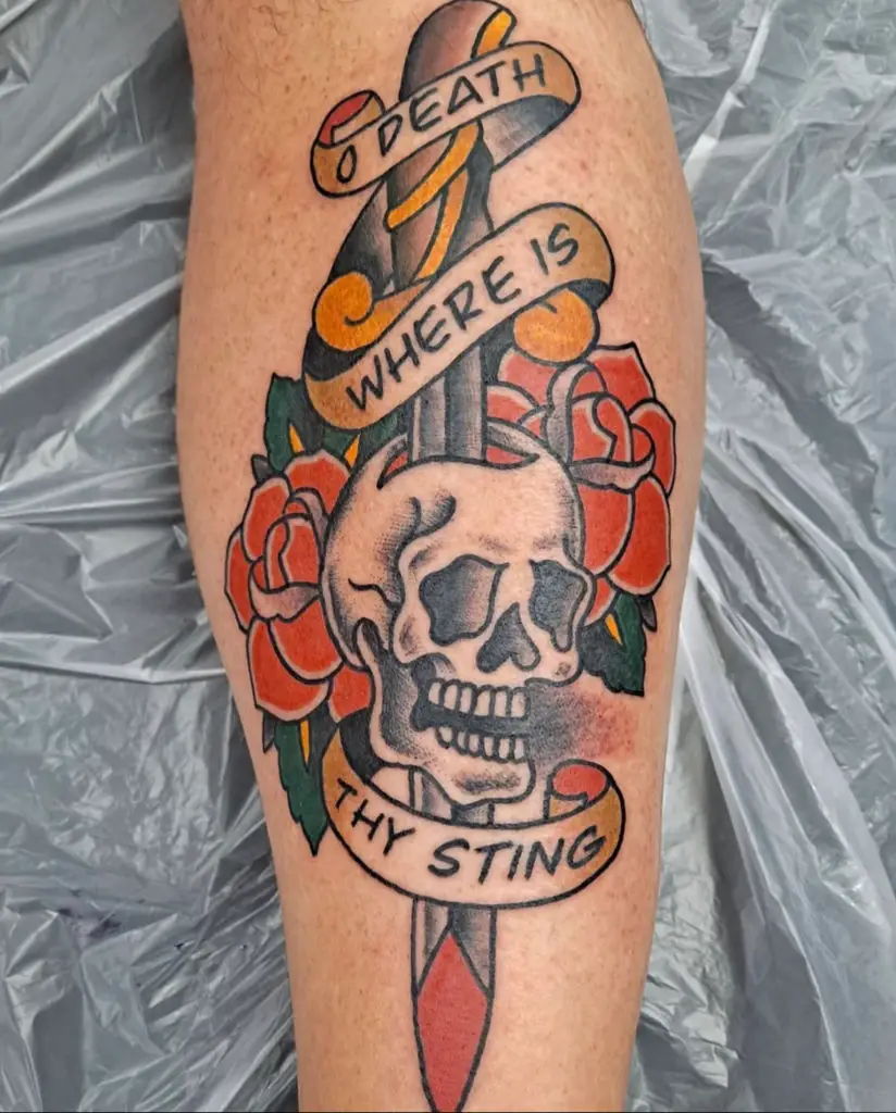 a tattoo of a skull and dagger in a traditional style by Mike Valadez at Artistic Impressions Tattoo Studio in Katy, Texas