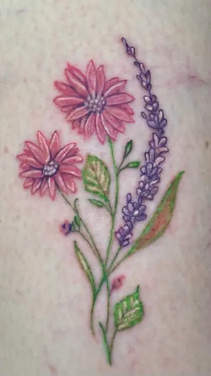 a tattoo of flowers by Ulisses at Artistic Impressions Tattoo Studio in Katy, Texas