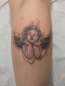 Angelic tattoo made with thin line weights, and in abstract form. Tattooed by Jacque, at Artistic Impressions Tattoo Studio in Katy, Texas