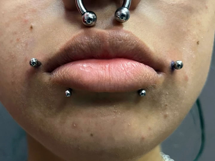 oral piercings by Cadin Rose at Artistic Impressions Tattoo Studio in Katy and Cypress, Texas