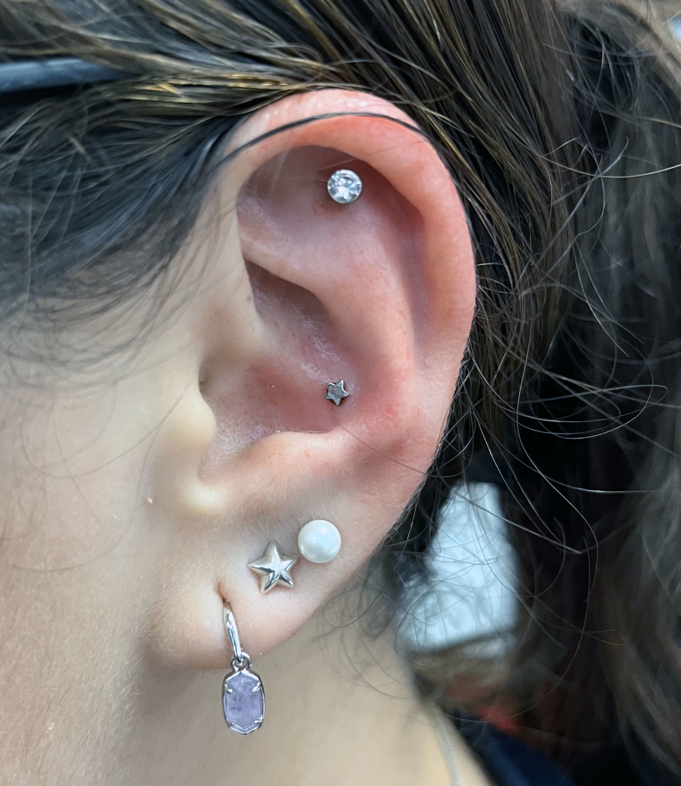 Ear Piercing by Cadin Rose at Artistic Impressions Tattoo Studio located in Katy, Texas