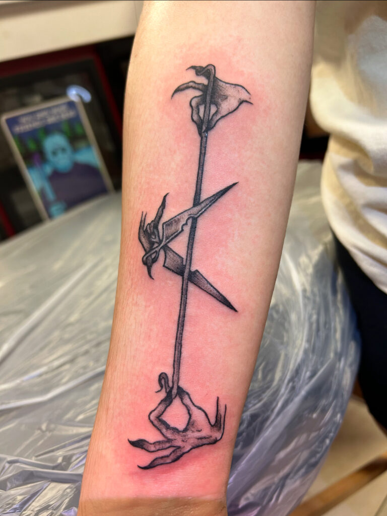 Scissors tattooed by Colton at the best tattoo shop in Katy, Texas at Artistic Impressions Tattoo Studio.