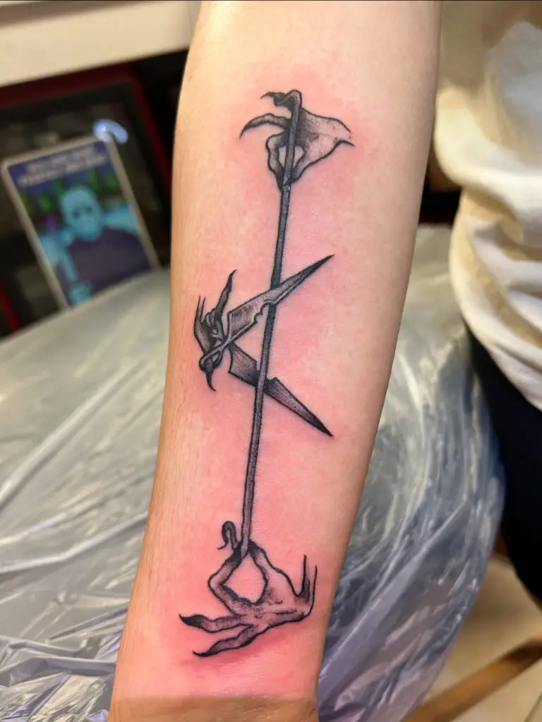 Scissors tattooed by Colton at the best tattoo shop in Katy, Texas at Artistic Impressions Tattoo Studio.