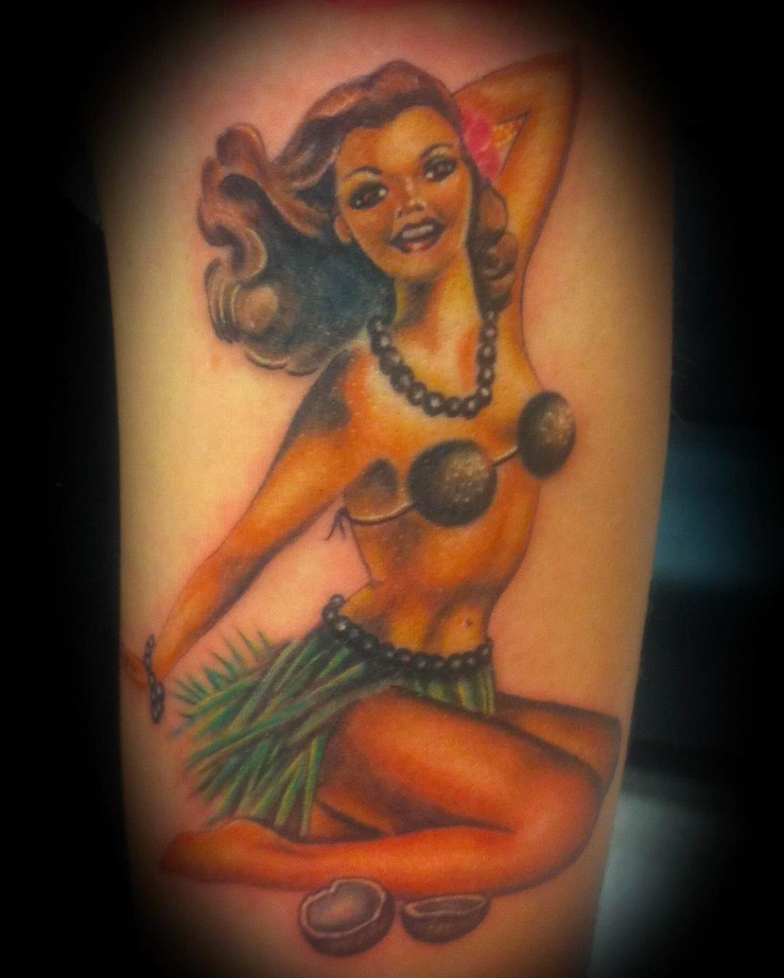 Pin-up tattoo by G at Artistic Impressions Tattoo Studio located in the Katy, Texas. The best tattoo studio