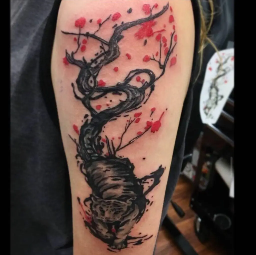 Cherry blossom tree tattoo by G at Artistic Impressions Tattoo Studio located in the Katy, Texas. The best tattoo studio