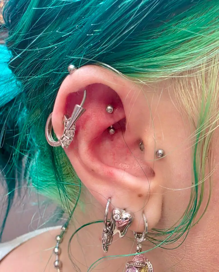 Shelby's ear piercing at Artistic Impressions Tattoo Studio in Sugarland, Texas