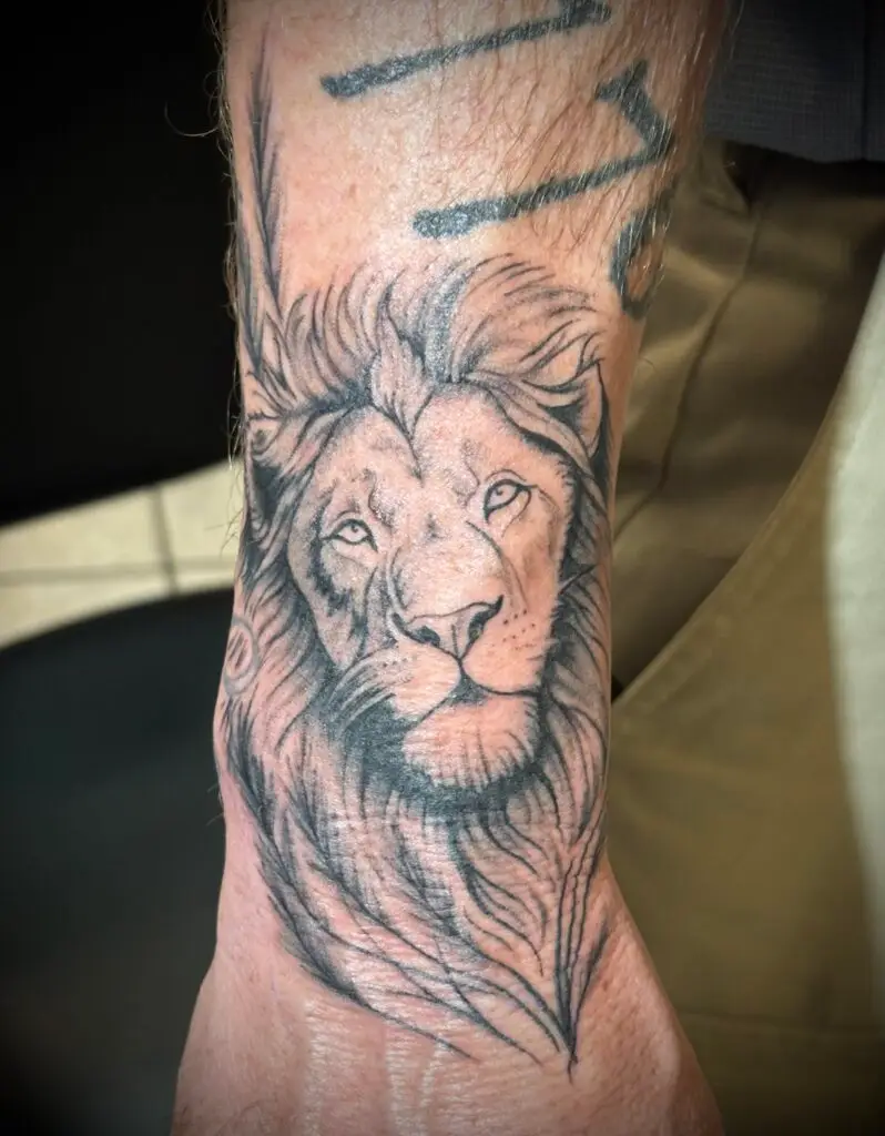 Savanna tattooed this lion tattoo at Artistic Impressions Tattoo Studio in Sugarland, Texas