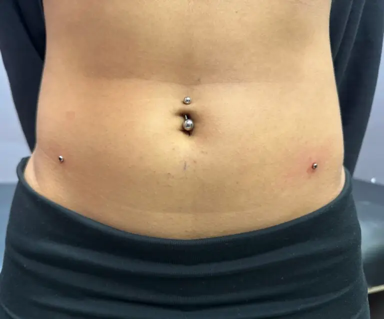 Shelby's  piercings at Artistic Impressions Tattoo Studio in Sugarland, Texas