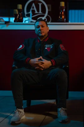 Tattoo artist Alejandro at Artistic Impressions Tattoo Studio, a professional artist specializing in custom tattoo designs and detailed ink work.