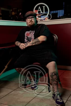 Hunter an awesome tattoo artist at Artistic Impressions Tattoo Studio in Katy, Texas